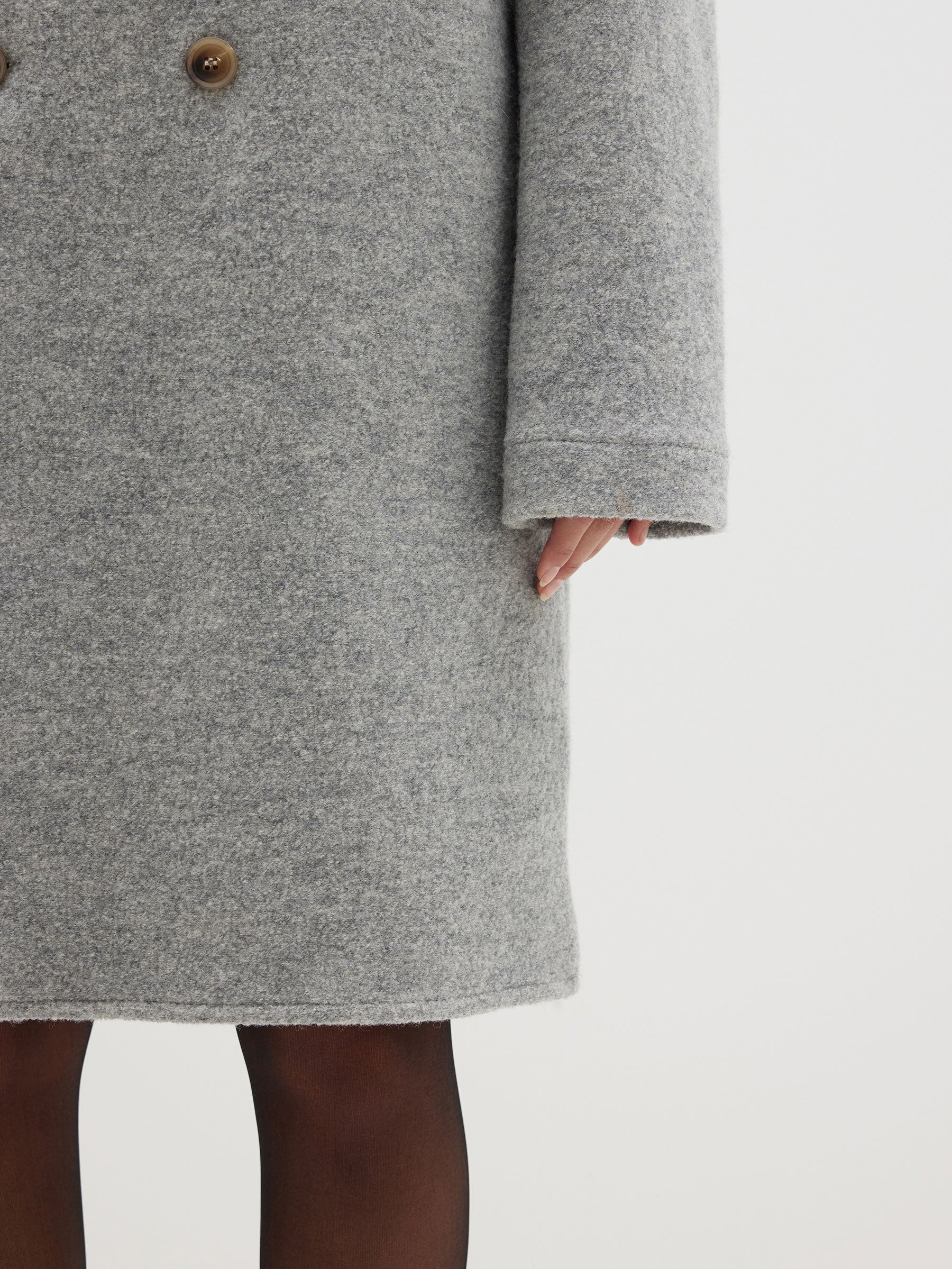 woollen rounded sleeve coat