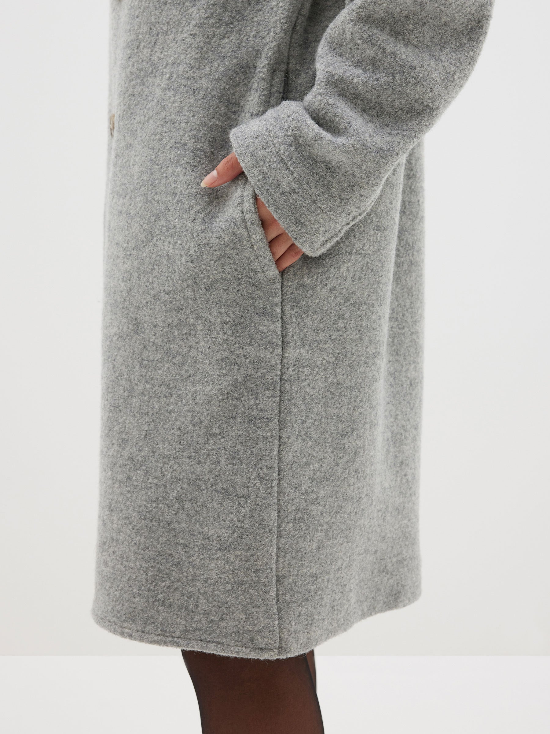 woollen rounded sleeve coat