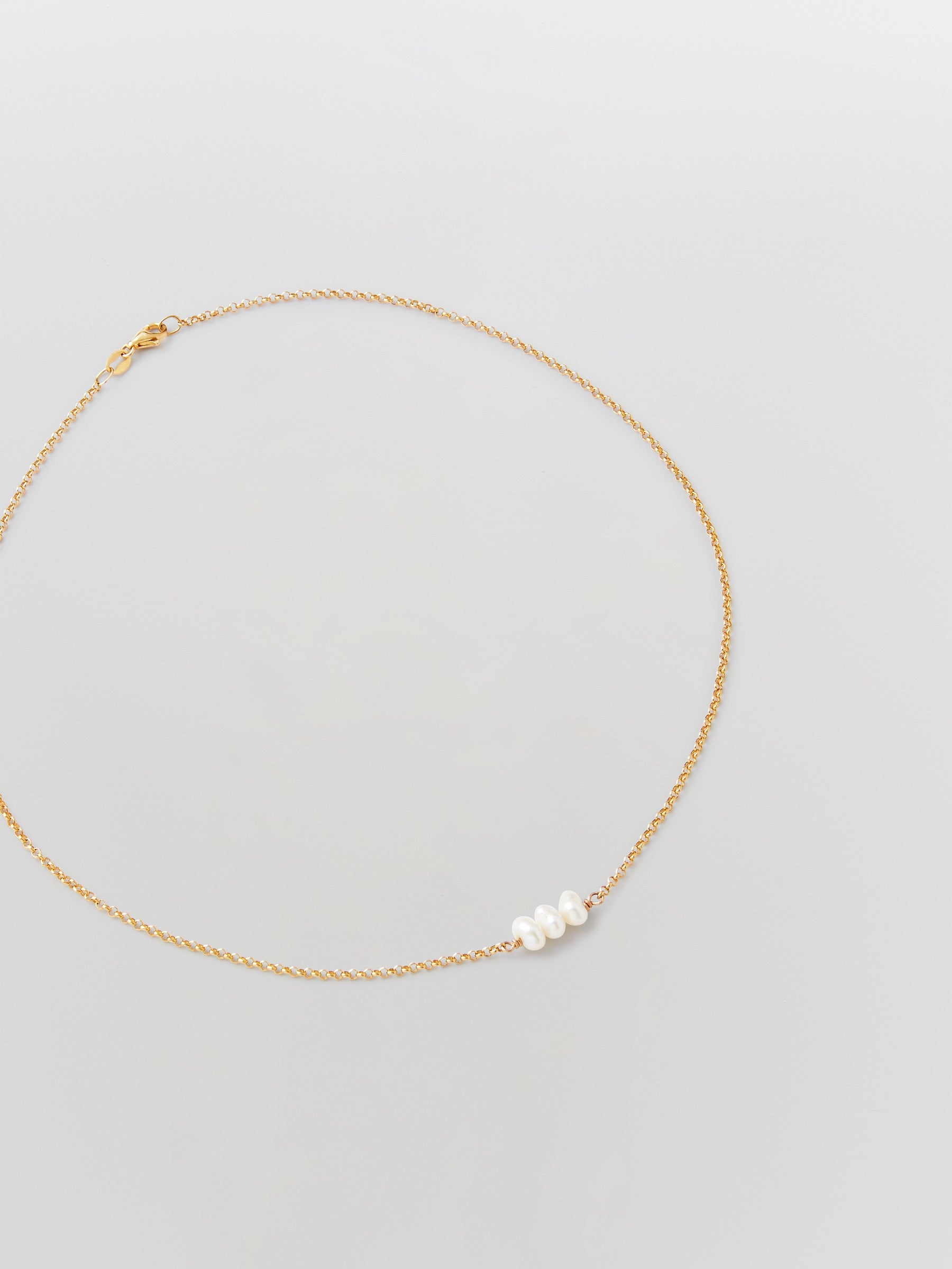 the line of sun triple pearl necklace