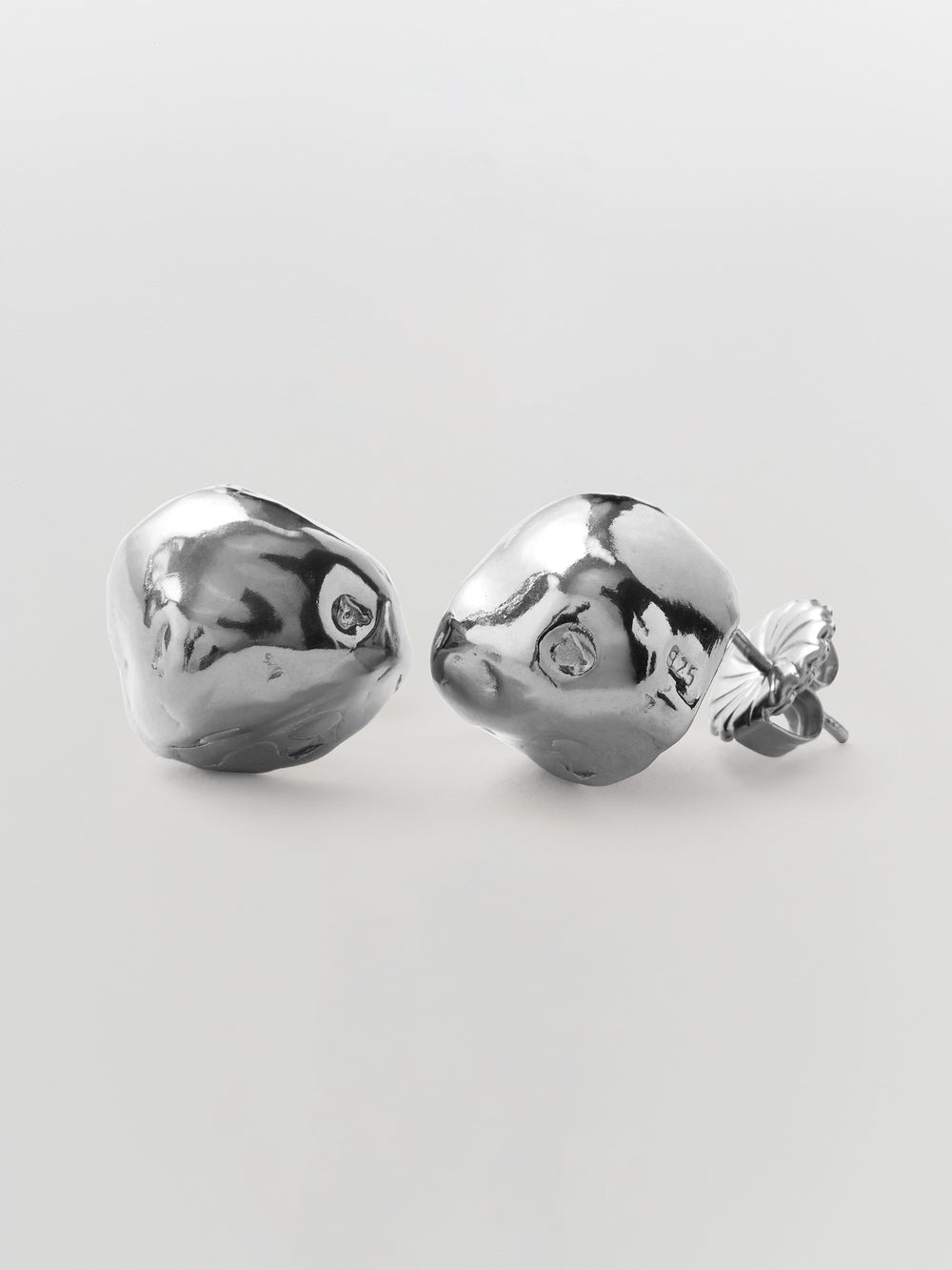 released from love cast pearl silver studs