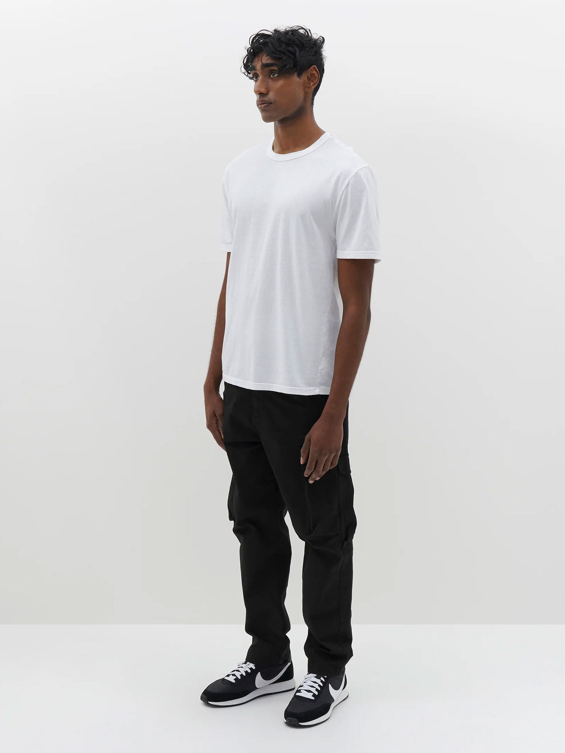 Tom Holland, men's white crew-neck shirt and black pants outfit, png |  PNGEgg