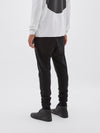 bassike slim tapered track pant ll in black