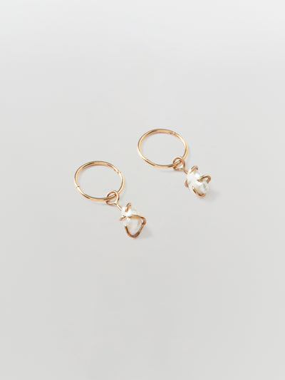 the line of sun raw pearl earring